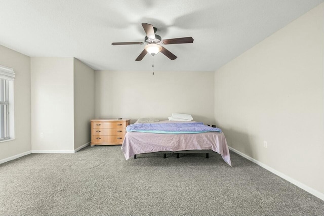 bedroom featuring ceiling fan and carpet floors