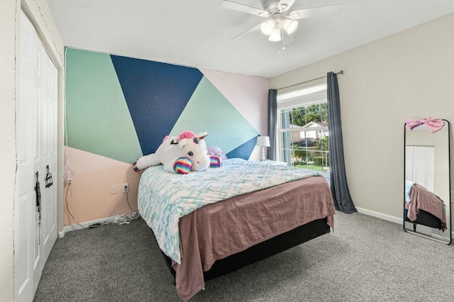 carpeted bedroom with ceiling fan