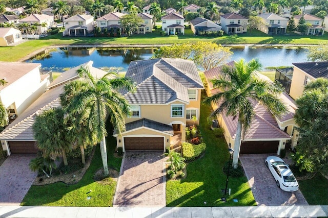 drone / aerial view with a water view