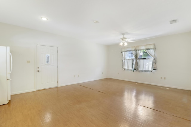 interior space featuring ceiling fan and light hardwood / wood-style flooring