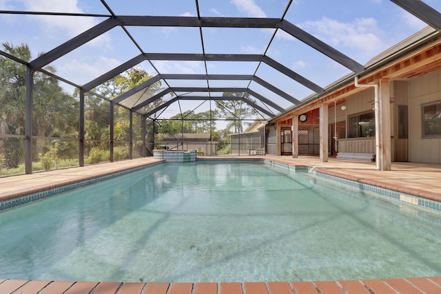 view of pool featuring a patio and a lanai