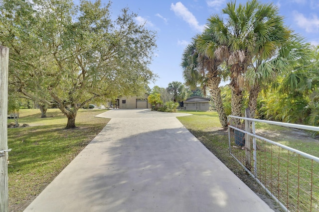 view of front facade with a garage and a front yard