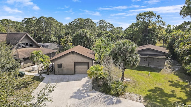 view of front of property with a lanai and a front lawn