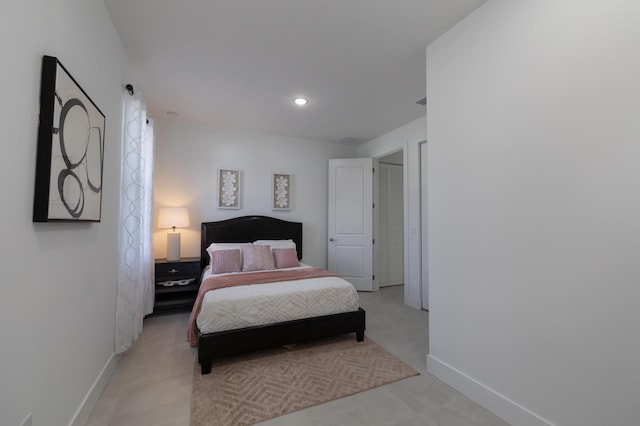 bedroom featuring light colored carpet