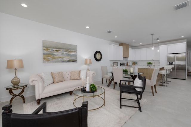 living room featuring sink