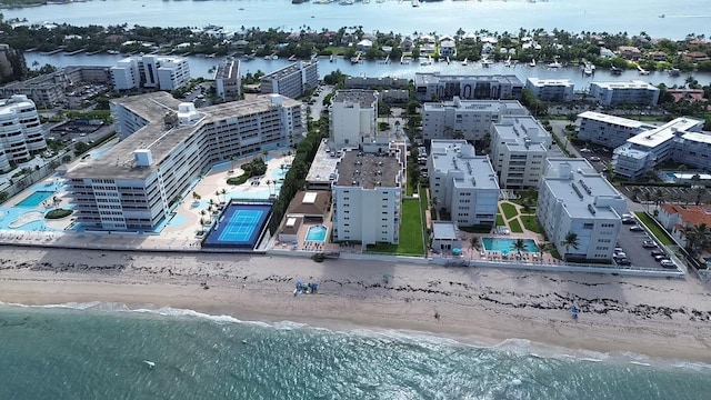 bird's eye view with a view of the beach and a water view