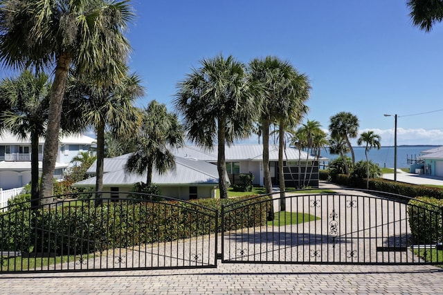 view of gate featuring a water view