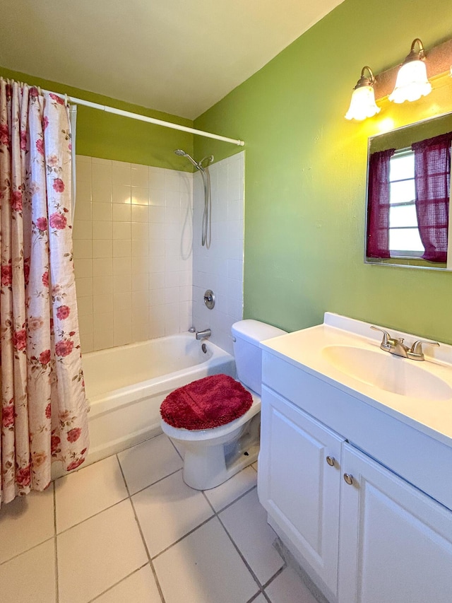 full bathroom featuring tile patterned flooring, vanity, toilet, and shower / bath combo with shower curtain