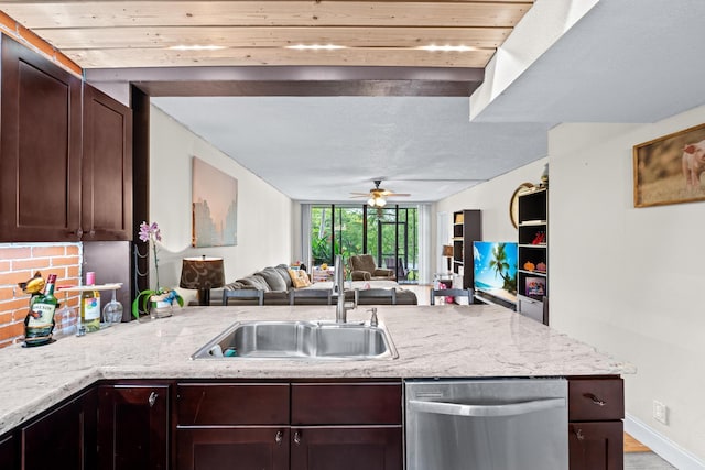 kitchen with sink, light wood-type flooring, stainless steel dishwasher, ceiling fan, and light stone countertops