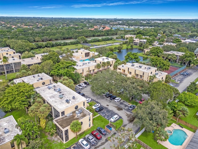 drone / aerial view with a water view