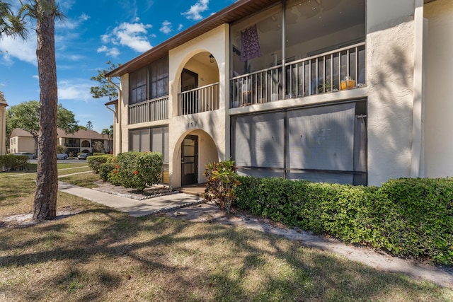 exterior space with stucco siding