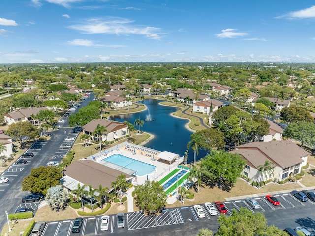 aerial view featuring a water view and a residential view