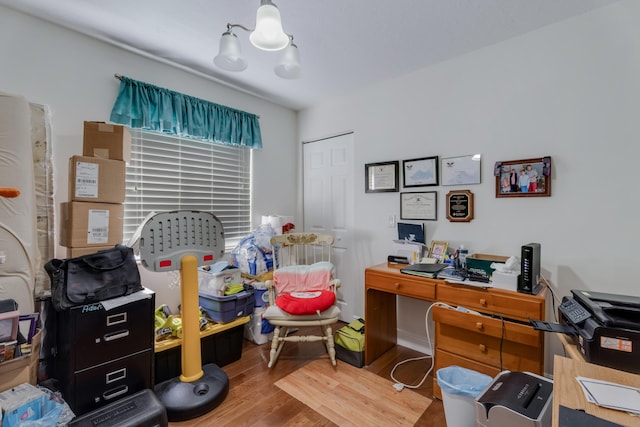 home office with wood finished floors