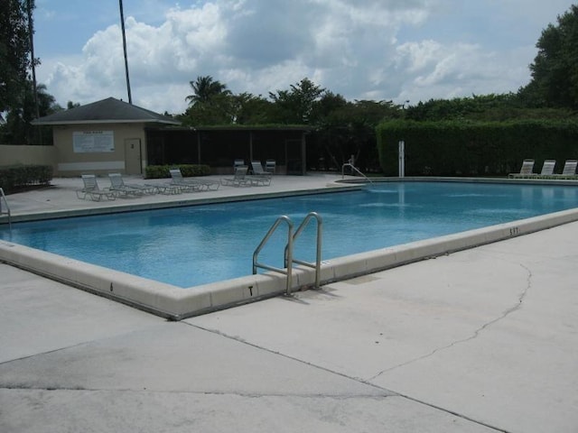 view of pool featuring a patio area