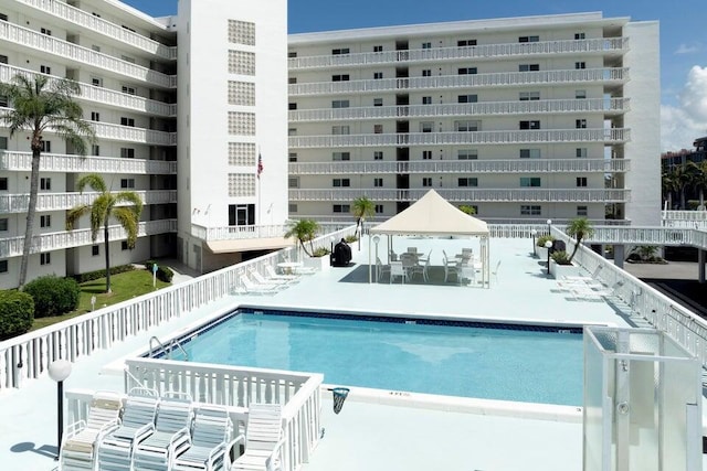 view of pool with a gazebo and a patio