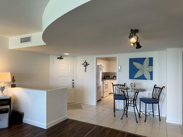 dining room featuring light wood-type flooring