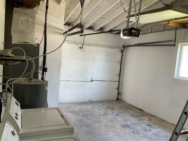 garage with washer / clothes dryer, a garage door opener, and water heater