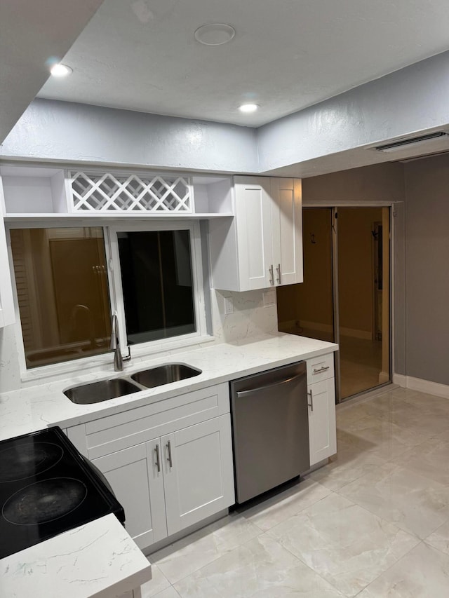 kitchen with white cabinetry, sink, electric range, and dishwasher