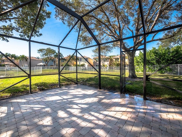 view of patio / terrace with a lanai