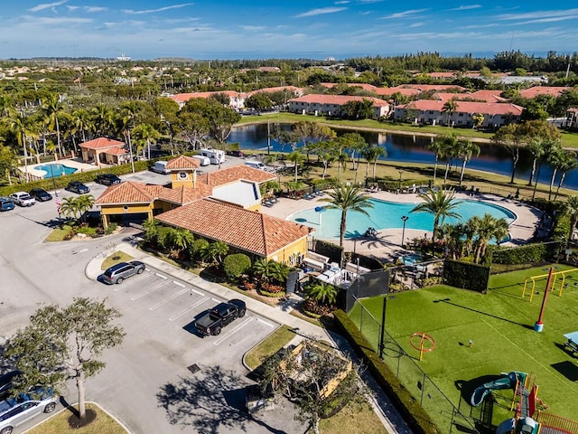 drone / aerial view with a water view