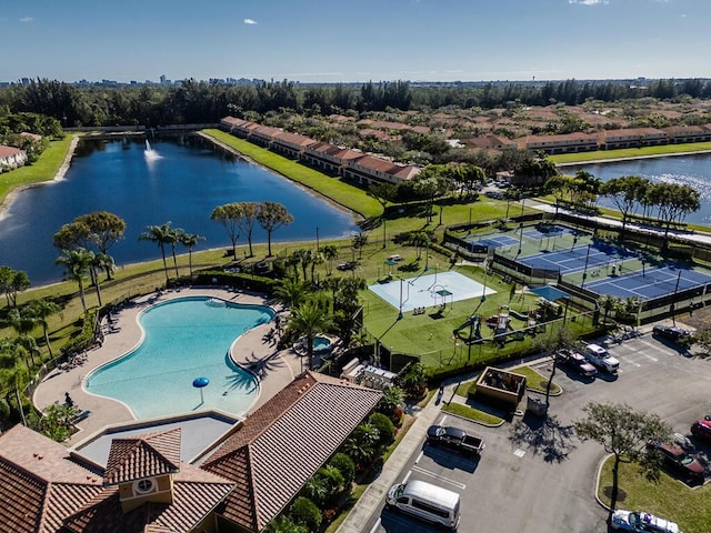 bird's eye view with a water view