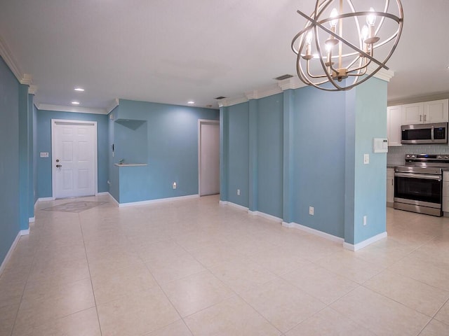 interior space featuring light tile patterned floors, ornamental molding, and a chandelier