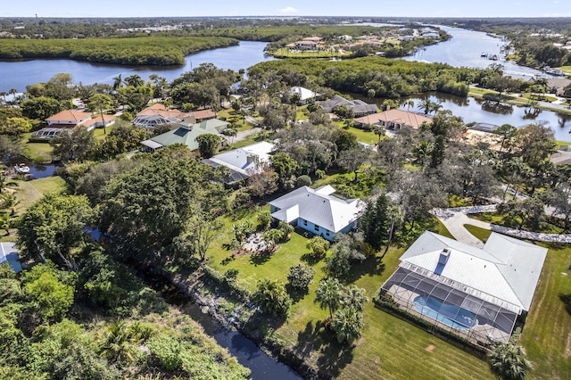 birds eye view of property featuring a water view