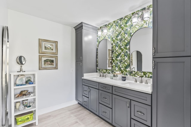 bathroom featuring vanity and hardwood / wood-style floors