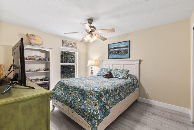 bathroom with hardwood / wood-style flooring and vanity