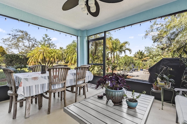 sunroom / solarium with ceiling fan