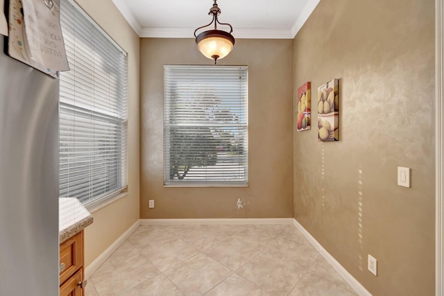 tiled empty room with crown molding