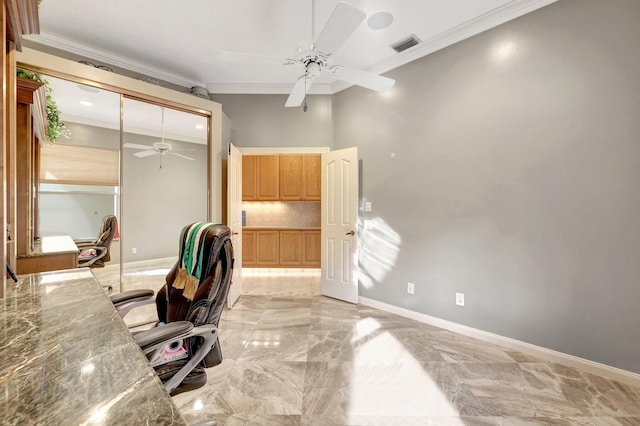 office space with ceiling fan and ornamental molding