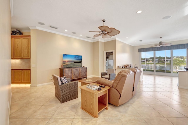 tiled living room with crown molding and ceiling fan