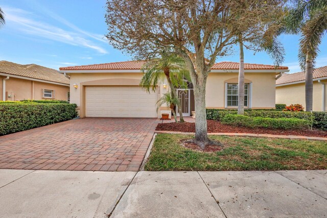 view of front of home with a garage