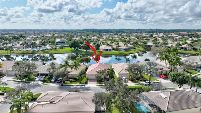 bird's eye view with a water view