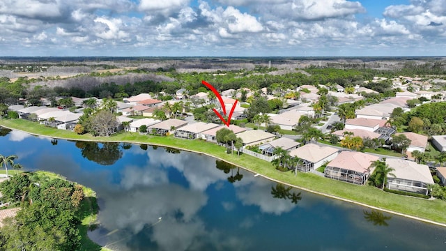 drone / aerial view with a water view