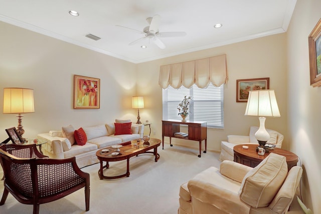 carpeted living room featuring crown molding and ceiling fan