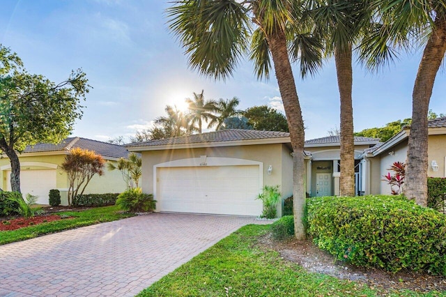 view of front of property featuring a garage