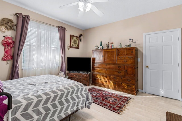 bedroom featuring ceiling fan