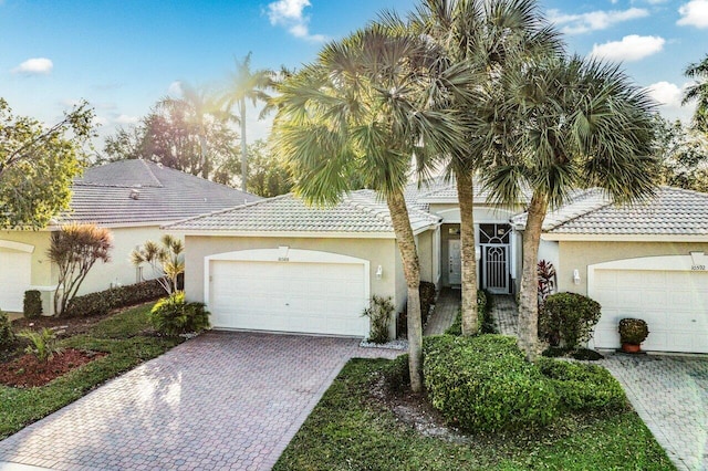 view of front of property with a garage