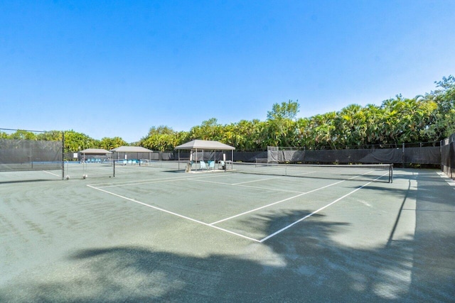 view of sport court with a gazebo