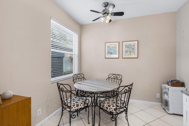 dining room featuring light tile patterned flooring and ceiling fan