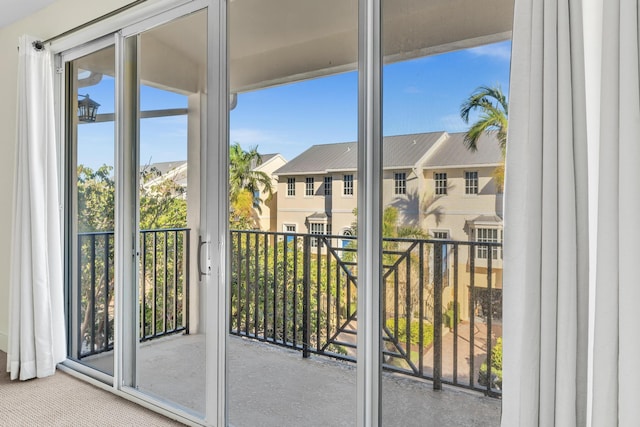 doorway to outside featuring a healthy amount of sunlight