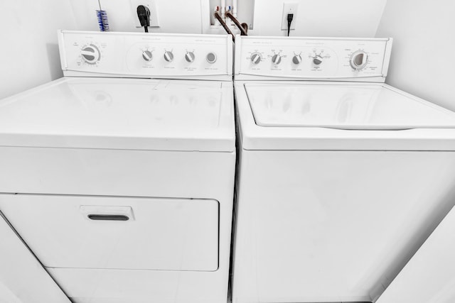 laundry area featuring washing machine and dryer