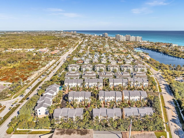 drone / aerial view featuring a water view