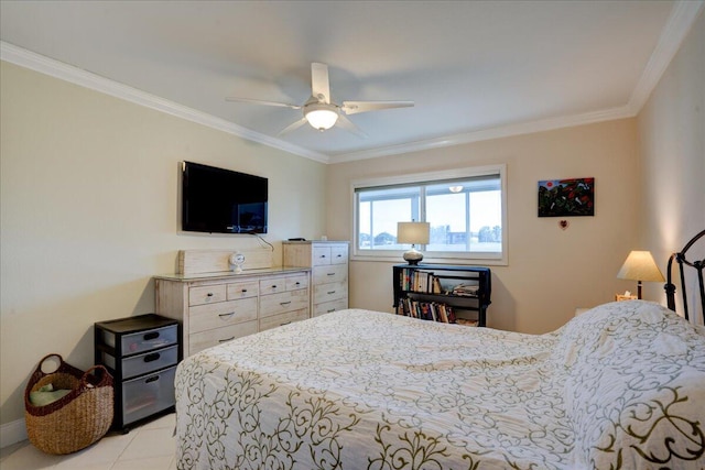 bedroom featuring light tile patterned floors, ornamental molding, and ceiling fan