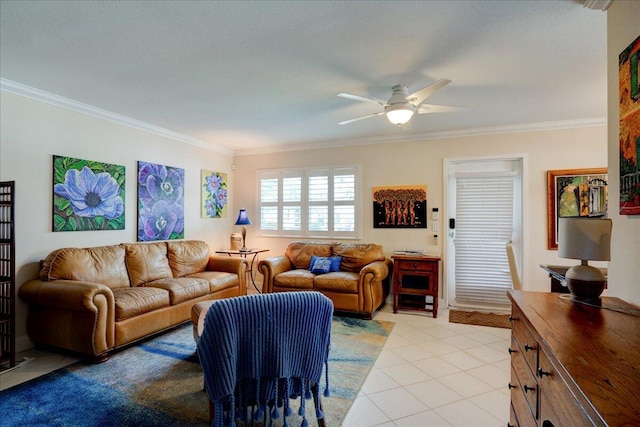 living room featuring light tile patterned floors, ornamental molding, and ceiling fan