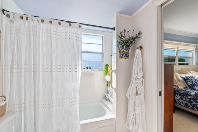 bathroom with shower / bath combination with curtain