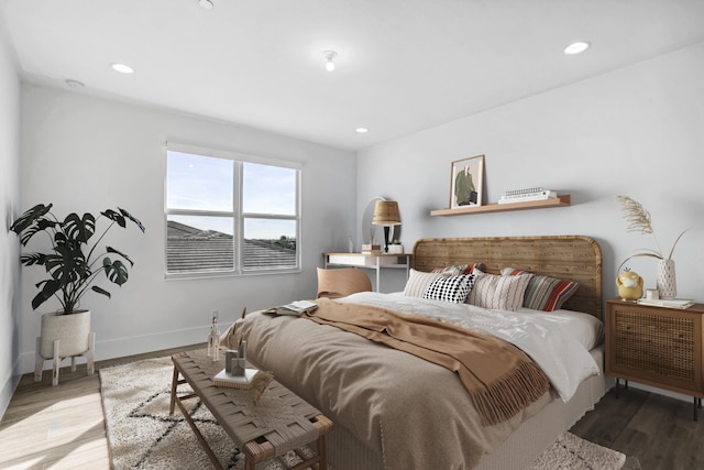 bedroom featuring hardwood / wood-style flooring