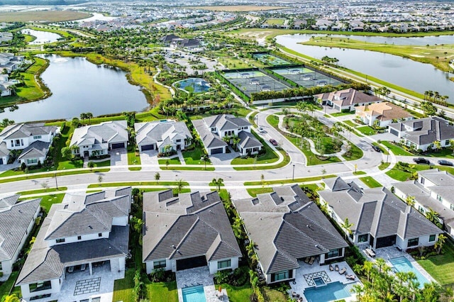 birds eye view of property featuring a water view